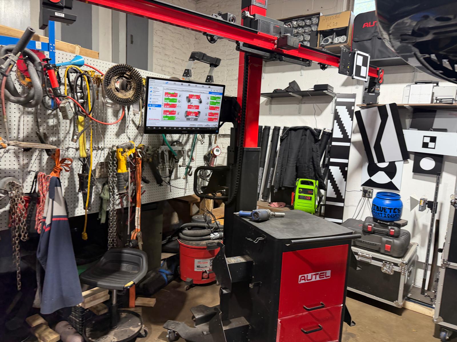 Experienced technician performing ADAS calibration